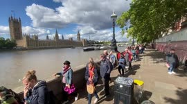 Beck it up: Temporary halt issues as Beckham and thousands queue for Queen's coffin now estimated at 24 hour wait