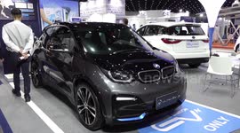 Electric vehicles displayed at manufacturer trade show in Bangkok, Thailand