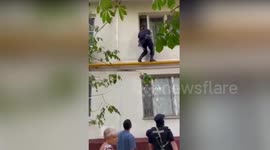 Police save sobbing two-year-old boy from window ledge in Russia