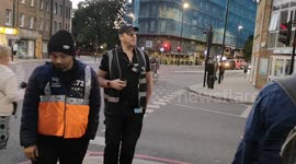 Steward keeps spirits up for those in long queue to see Queen lying in state on Sunday