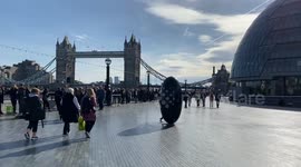 Crowds queue near Tower Bridge on the last full day of The Queen’s lying-in-state