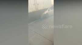 Dozens of vehicles accident in a row on Indonesian toll road allegedly due to grass burning smoke, one killed