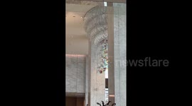 Light pendants and chandeliers shake at Marriott hotel as earthquake hits Taiwan