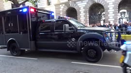 US President Biden's motorcade drives through central London