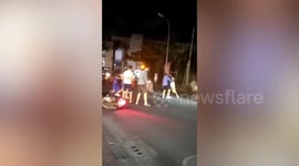 Foreign tourists pile on 'Russian fraudster' in street fight in Bali, Indonesia