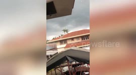 Terrifying tornado sparks panic as it rips through homes in the Philippines