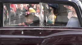 HM Queen's Funeral cortege passes along Whitehall in London with royals walking behind