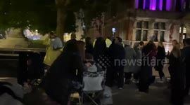 Mourners gather before sunrise on Parliament Street for Queen’s funeral