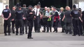 Person taken out by medics from the Long Walk in Windsor as the person was overcome waiting for the Queue