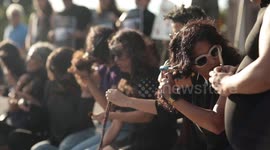 Iranian women cut their hair to protest death of Mahsa Amini