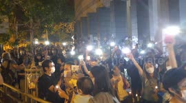 Vigil for Queen Elizabeth becomes moment of defiance as Hongkongers sing seditious song