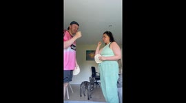 Couple attempts the tortilla challenge, gets photobombed by baby