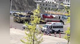 Coach transporting residents to quarantine tips over, killing 27 in southwest China