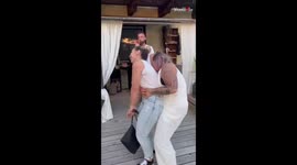 Tipsy girl turned upside down after she tries sitting on a broken railing