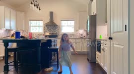 Cute youngster shows how to hula loop.