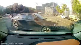 Chinese motorist stops car in middle of road so her daughter isn't late for school