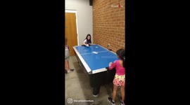 Genius little girl does a SICK impromptu trick shot while playing air hockey