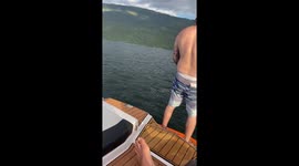 Man pushed off the boat while p**ing into the lake