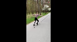 Skater girl flawlessly slaloming during a warm-up session