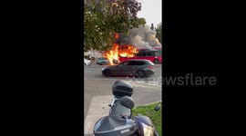 Bus engulfed by flames on busy road in Surrey
