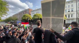 Hundreds protest for Mahsa Amini outside embassy of Iran in London.