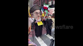 Images of Ebrahim Raisi during protest in New York, USA