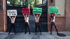 Mahsa Amini: Women's rights activists protest outside Iranian embassy in Madrid