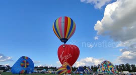 The first hot air balloon to take off at the Yorkshire ballon fiesta 2022 on the Knavesmire in York