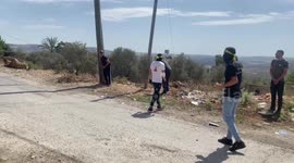 Palestinian demonstrators clash with Israeli forces, following a protest against the expropriation of Palestinian land by Israel, in the West Bank village of Kfar Qaddum near the Jewish settlement of Kedumim