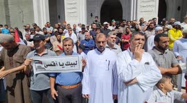 Palestinians take part in a rally in support of the Al-Aqsa mosque after Friday prayers in Rafah in the southern Gaza Strip