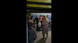 Children in sing in bomb shelter in Odesa, Ukraine, during Russian attack that allegedly used Iranian drones