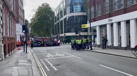 Anti-fascism and anti-immigration groups gather in central London under tight security measures