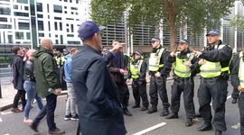 Far-right protesters confront police at rally against UK government's immigration policy