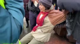 'Child' arrested by forceful riot police at an anti-war rally in Moscow, Russia