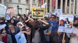 Women at Trafalgar Square rally cut their hair in echo of dramatic protests in Iran over death of Mahsa Amini