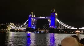 150 vessels covered in lights pass through the Thames in Central London in honour of The Queen