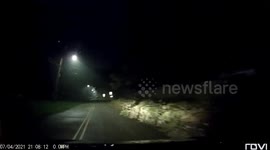 Fireworks explode in front of Uber driver