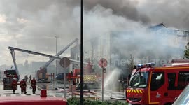 Firefighters battle blaze at Rungis International Market in suburban Paris