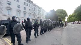 Dozens of riot police guard Iranian Embassy in London after Mahsa Amini protesters attack it with paint bombs