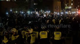 Mahsa Amini: Protesters chant waving phone lights after nightfall outside mosque with links to Supreme Leader of Iran