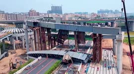 Miraculous escape for driver as steel girder falling from bridge crushes truck in China