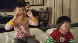 Funny toddler tries to perform CHICKEN DANCE for the first time in front of his parents