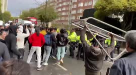 Another protest outside Iran Embassy in London turns violent as man hurls railings at police