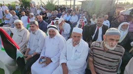 Palestinians gather during a demonstration next to the border fence with Israel, east of Gaza City in solidarity with al-Aqsa mosque