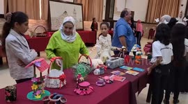 Children in Gaza recycle waste to create art