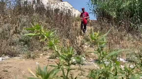 Gazan young man fights hard living conditions with making Arghul.