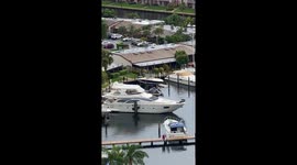 Police chasing a men in Hallandale beach with a boat in USA. Men jumped in to the intercoastal