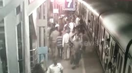 Nimble cop saves woman from getting crushed under wheels after she falls from moving train in western India