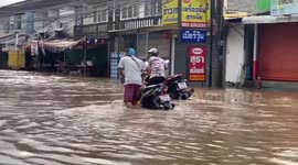 Floods close schools in northeast Thailand as Typhoon Noru approaches country