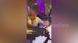 Baby meant to be delivering ring to parents at wedding falls asleep on the job